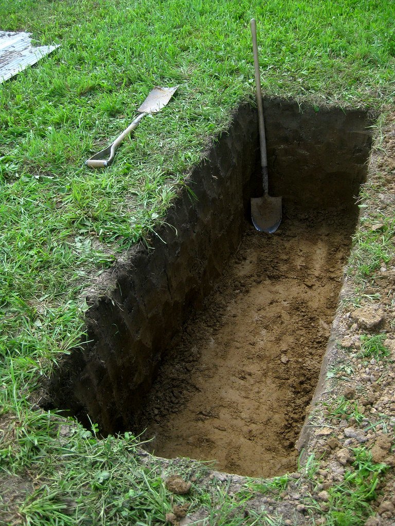 Grave hole for coffin